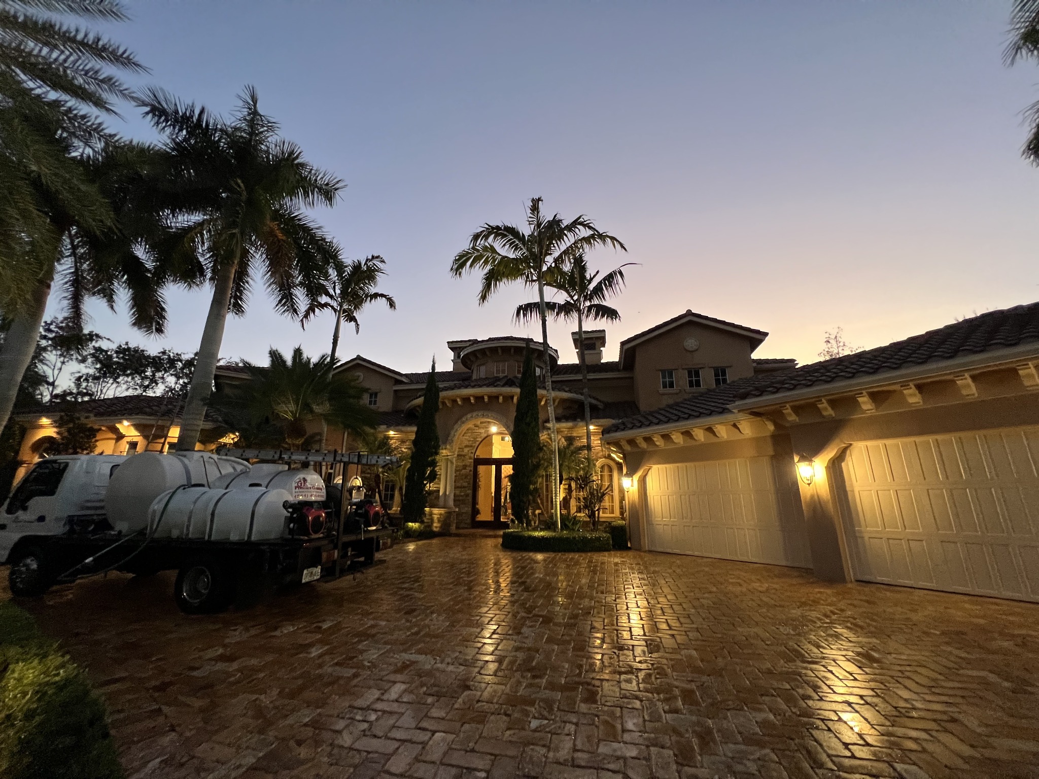 GK Pressure Cleaning truck at a South Florida property near Delray Beach